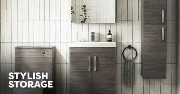 A bathroom vanity with organised storage and a clear countertop